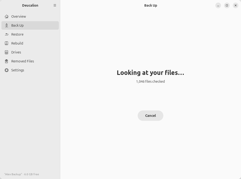 The page while Deucalion looks at your files: "Looking at your files…", a count of files checked,
and a Cancel button.