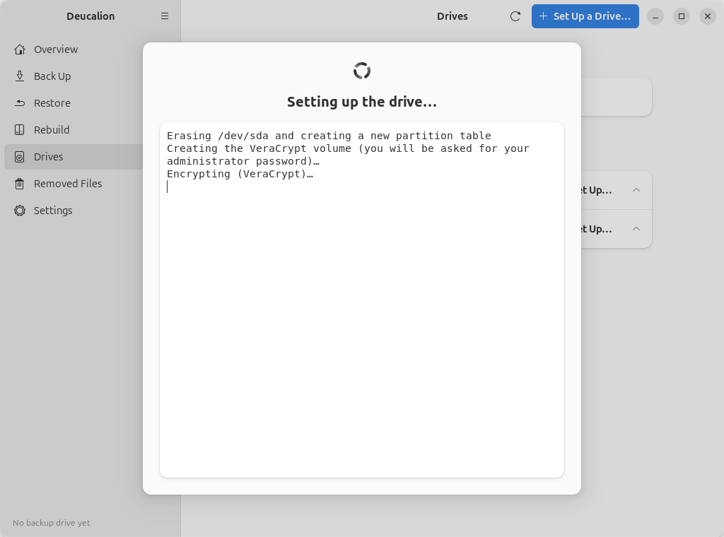 The setup in progress: "Setting up the drive…" and a log of what is happening.